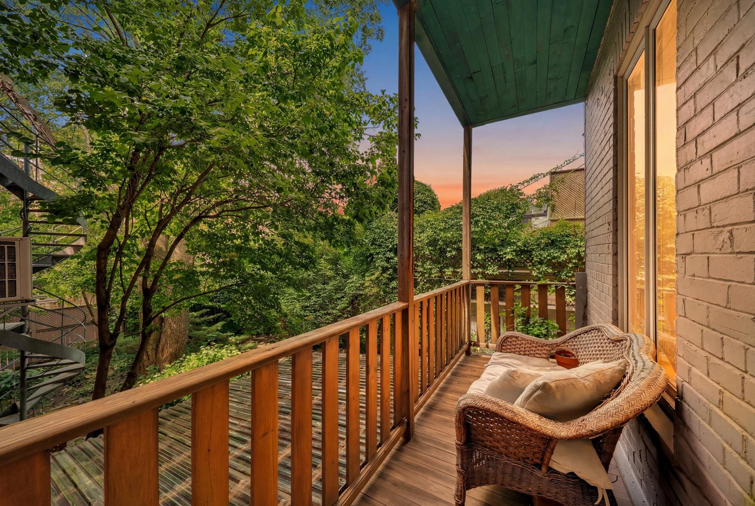 Private balcony overlooking mature greenery