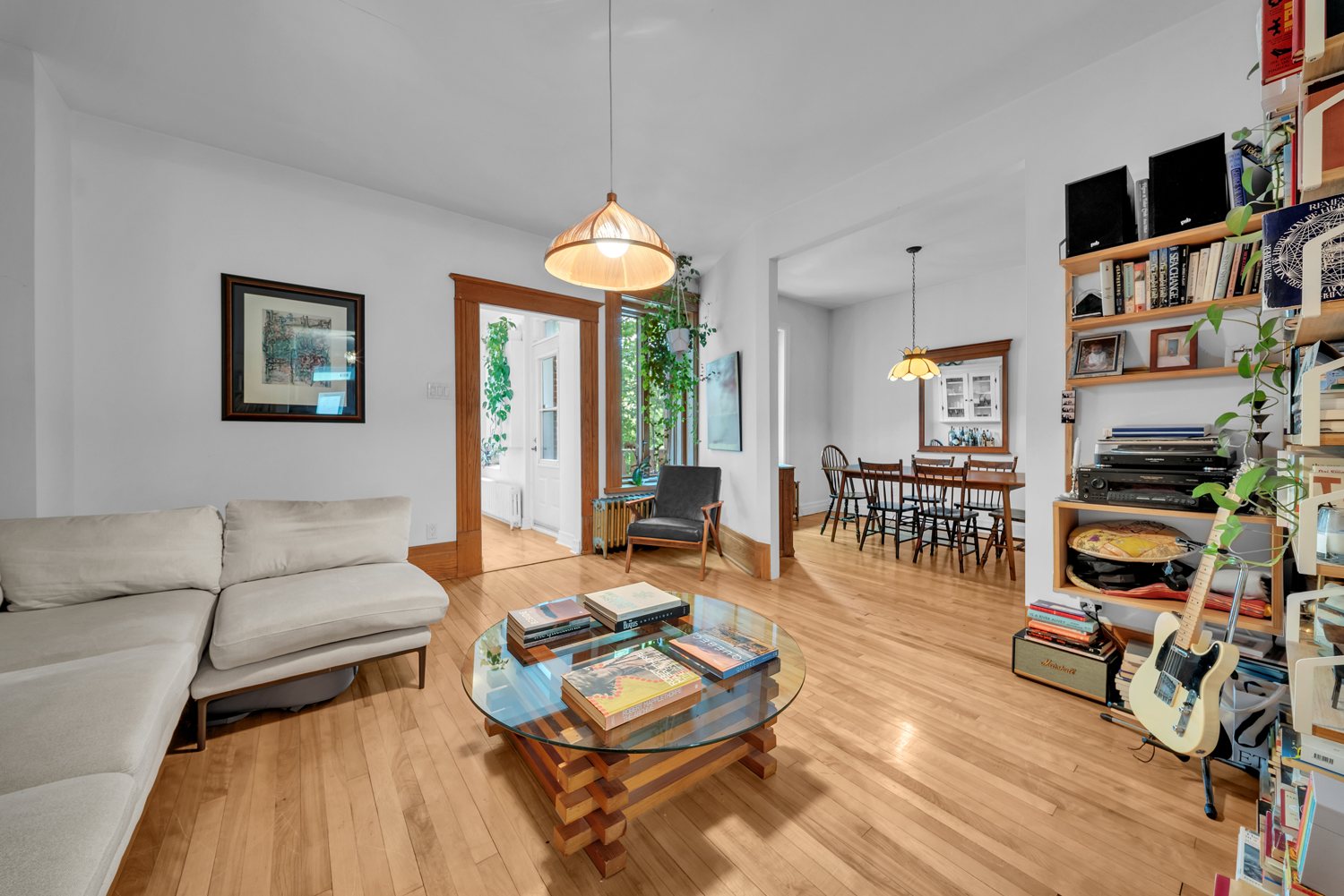 Living and dining areas filled with natural light