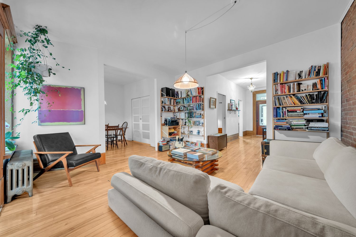 Open-plan living space viewed from the sitting area
