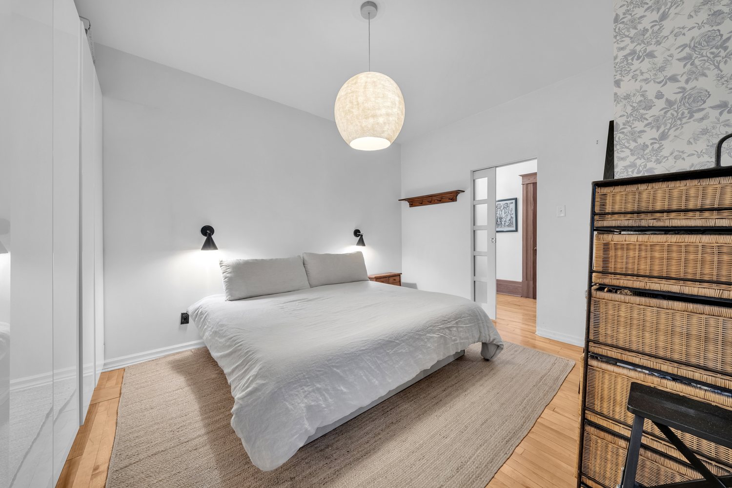 Primary bedroom with wall-to-wall storage
