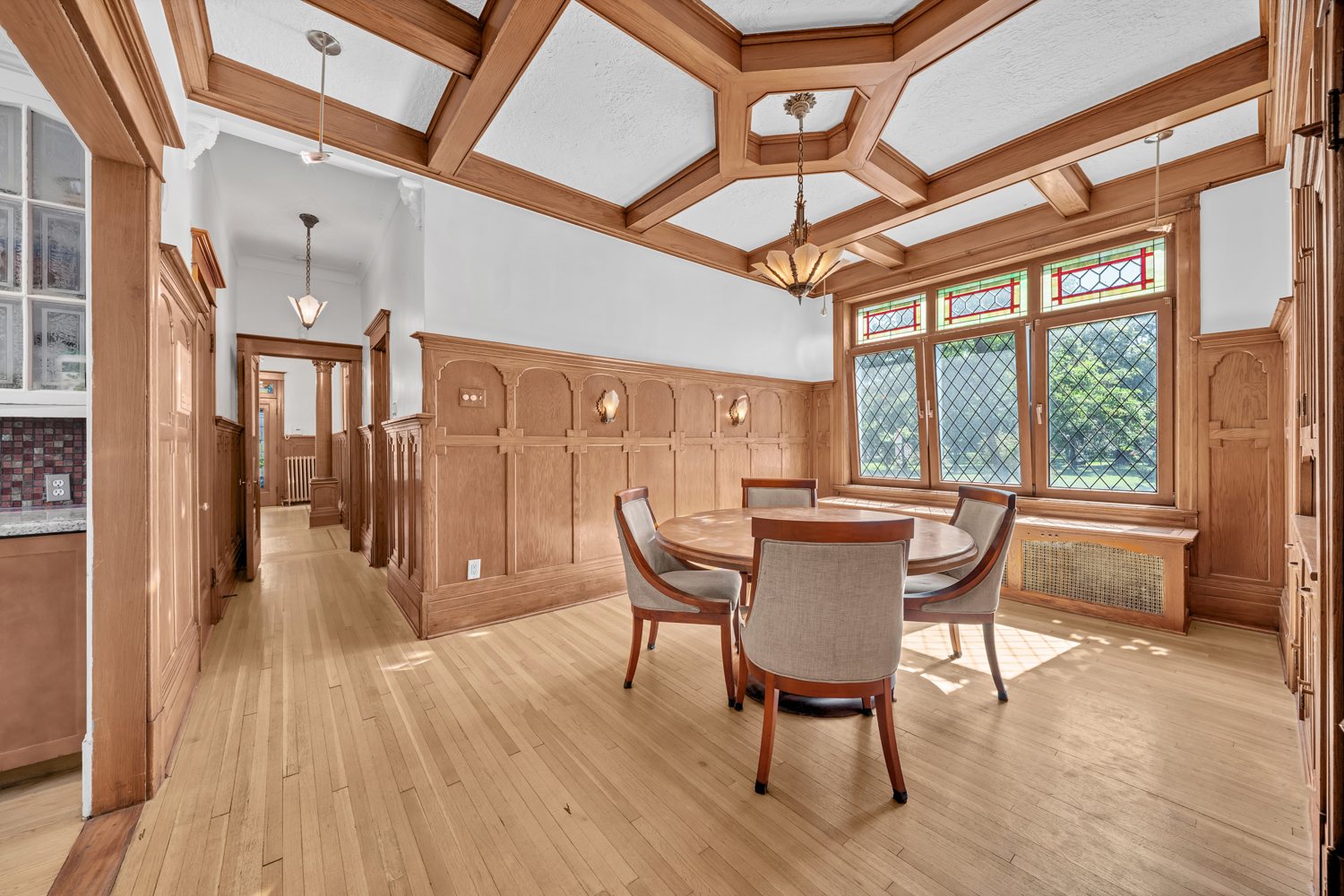 Wood-panelled drawing room with coffered ceiling