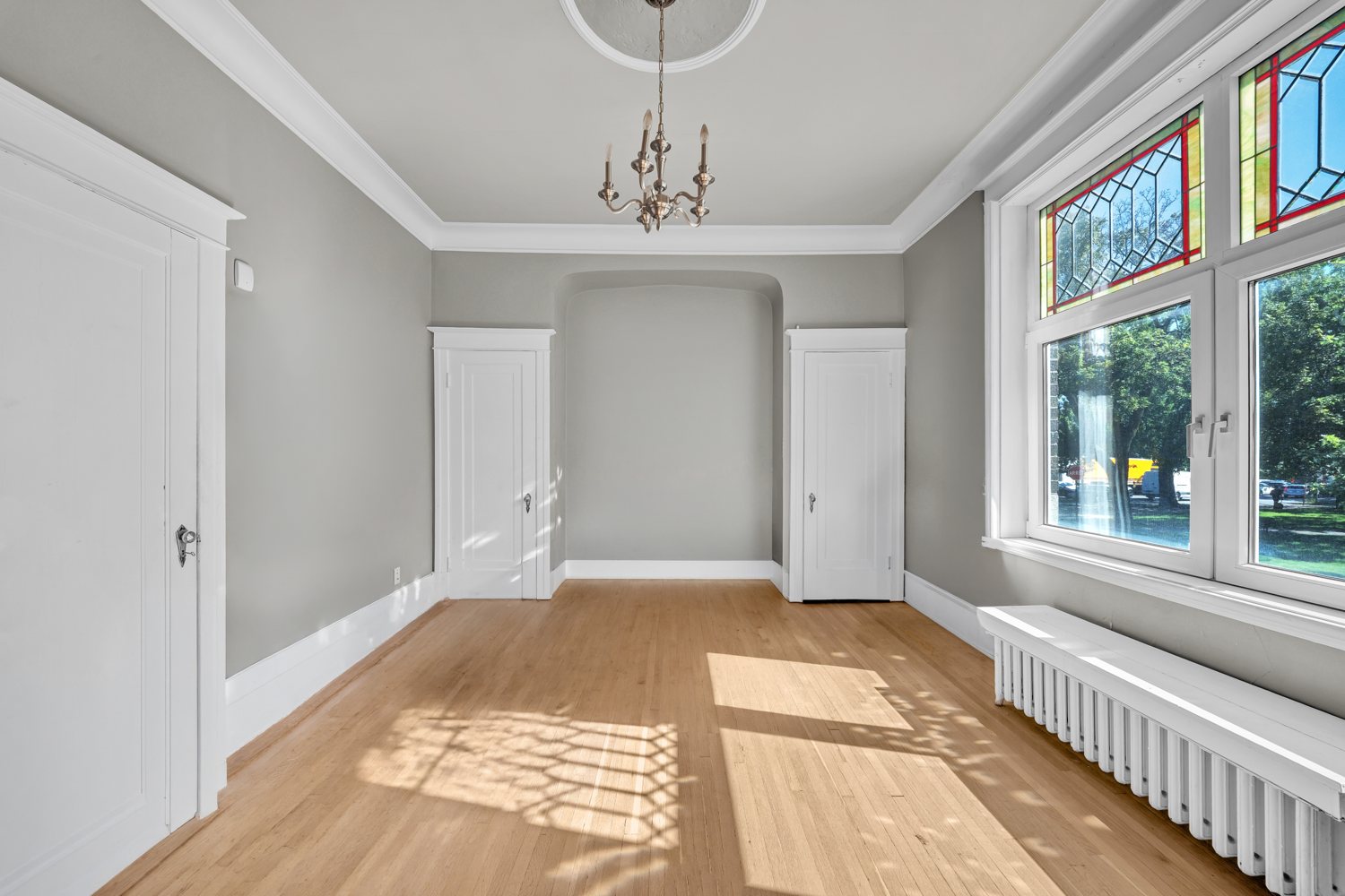Bedroom with stained-glass windows