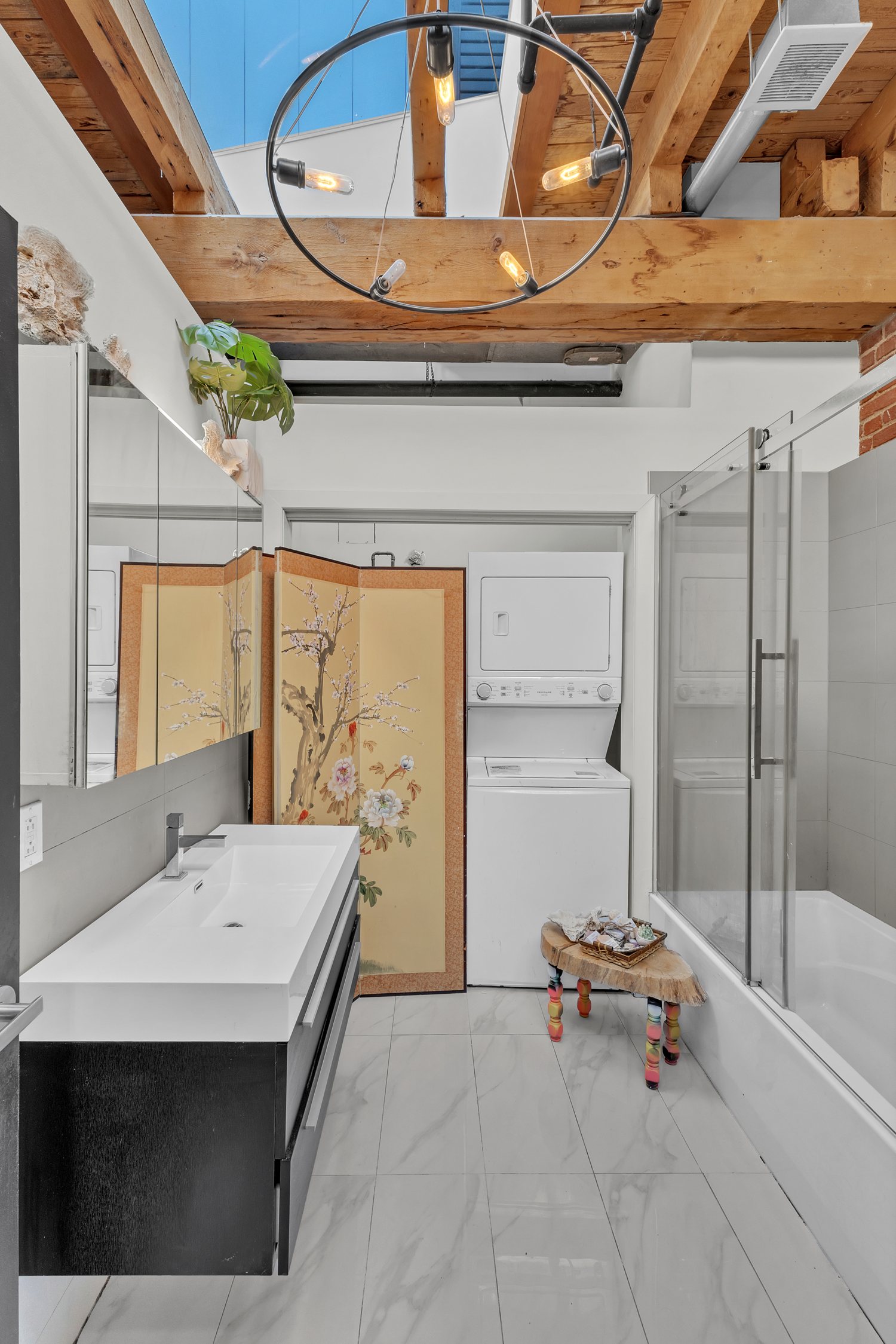 Kitchen beneath the loft's original timber structure